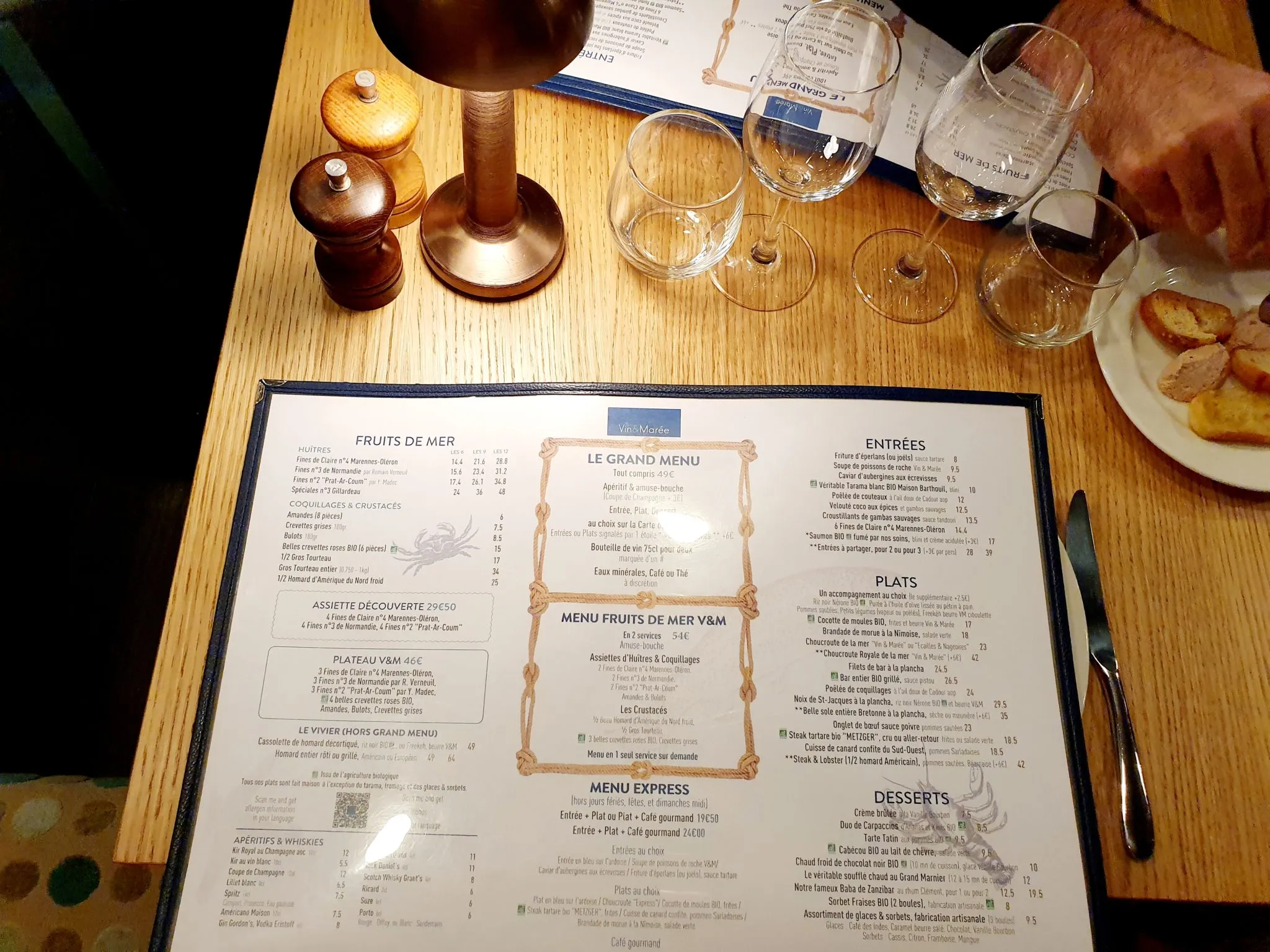 A beautifully set table at Vin et Marée, showcasing the attention to detail in the et restaurant menu presentation