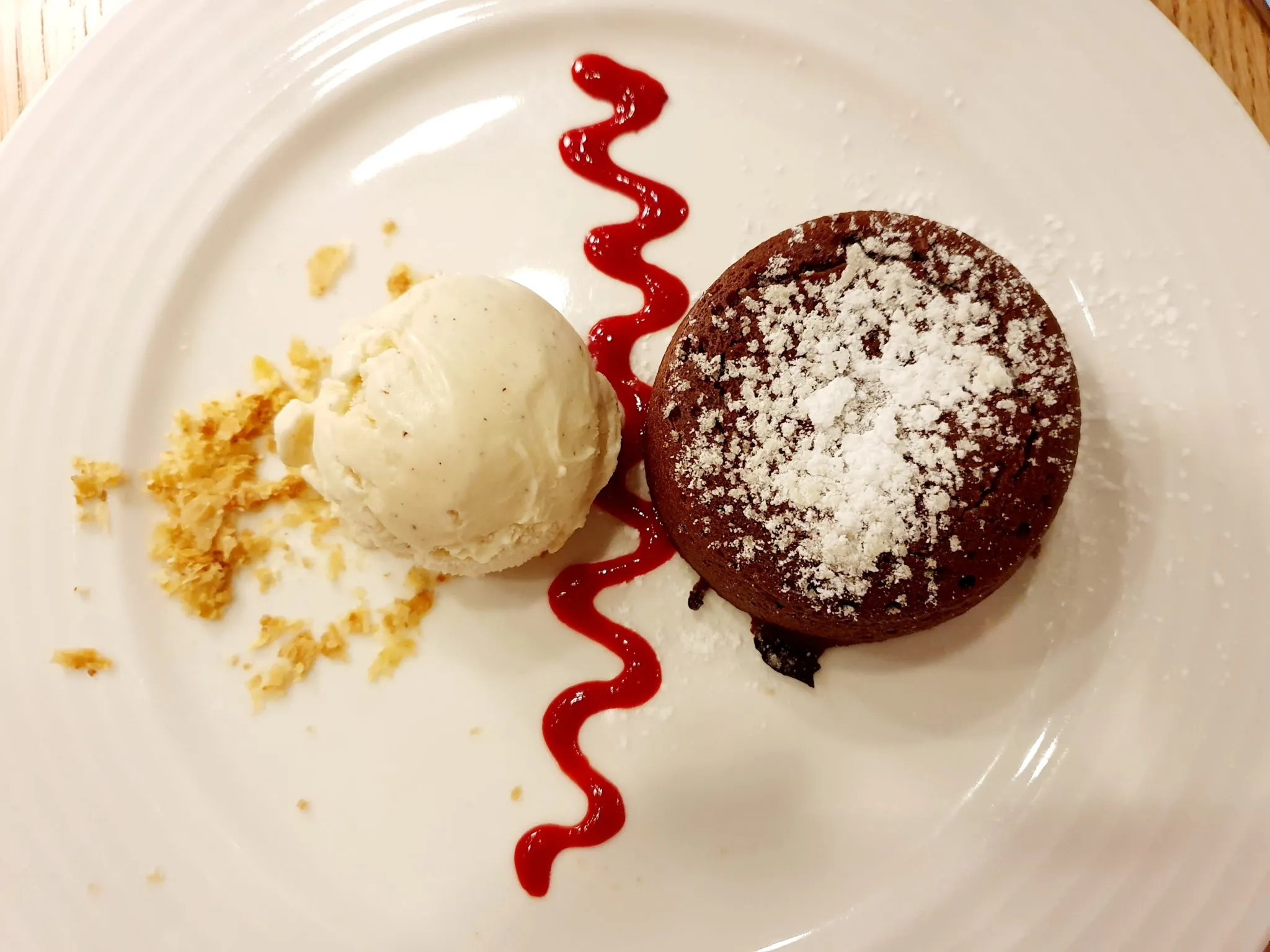 The delightful chocolate dessert with vanilla ice-cream, a satisfying end to the et restaurant menu