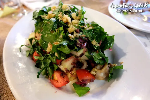 A Watercress Salad with pears and bleu cheese, a refreshing option on a modern Philippines restaurant menu