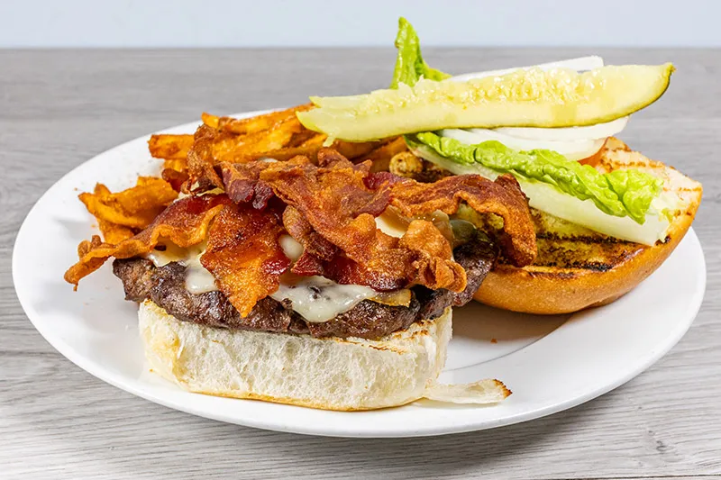 The Big Sky Burger, a signature Texas Wagyu dish from the sky restaurant victoria menu