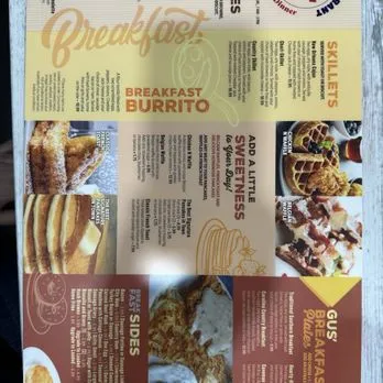 A delicious breakfast plate featuring pancakes and eggs at Gus Family Restaurant