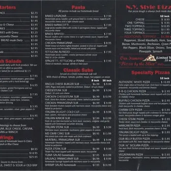 A family-sized pizza and pasta selection demonstrating the generous portion sizes at Italian Delight