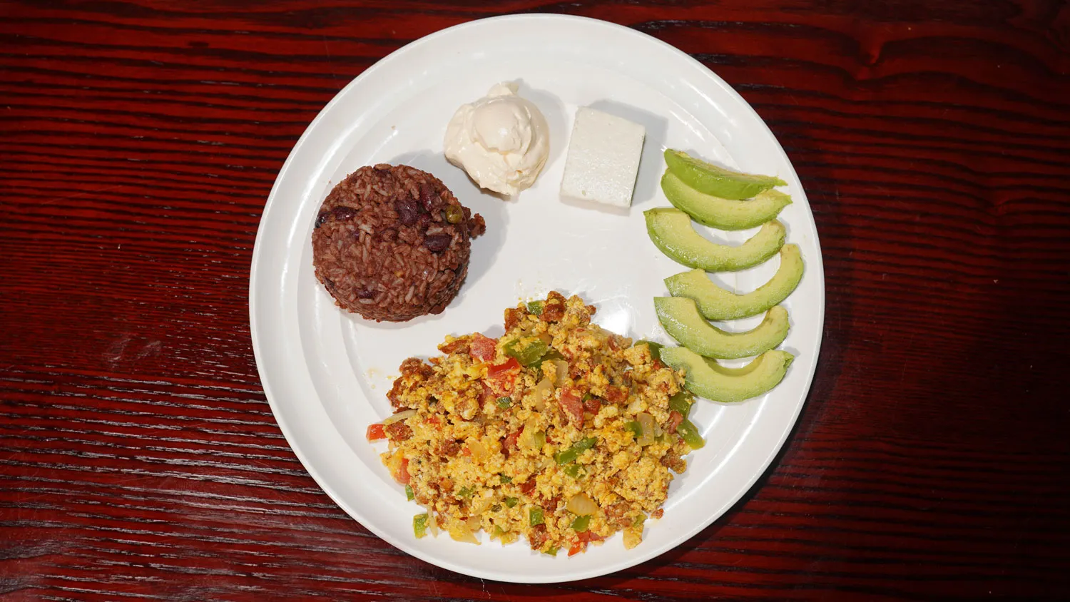 Chorizo with eggs, a classic breakfast dish featured on the armenia restaurant menu