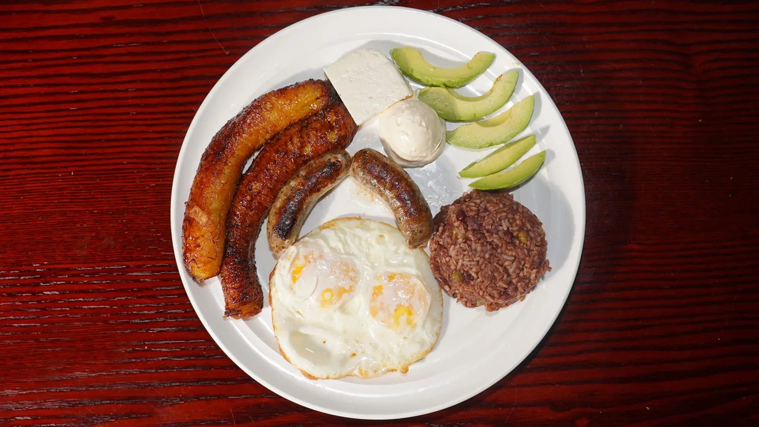 Longaniza and eggs, a savory dish from the armenia restaurant menu selections