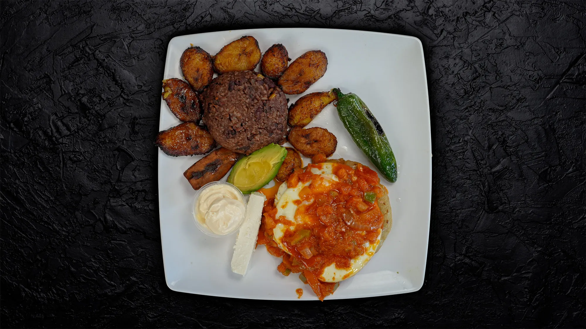 Super ranchero plate, a variation of the classic huevos rancheros on the armenia restaurant menu