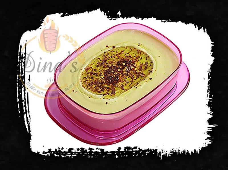 Creamy Hummus dip, a classic Mediterranean spread from the dina's restaurant menu