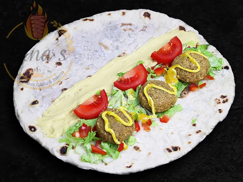 Dina's flavorful Falafel wrap, a signature item on the allintitle:dina's restaurant menu
