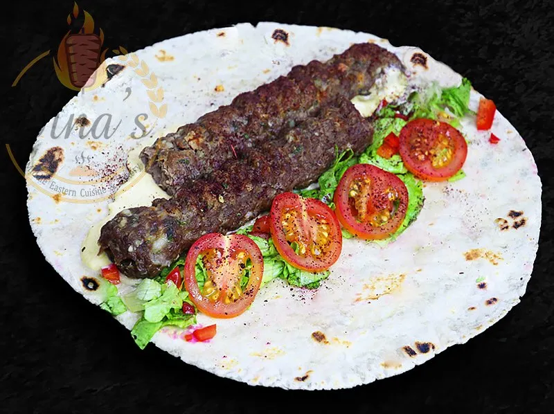 Succulent Beef &amp; Lamb Kufta Kebab wrap, showcasing Persian grilling on the dina's restaurant menu