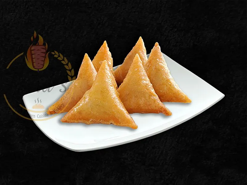 Crispy Samosa Roll, a versatile appetizer from the dina's restaurant menu