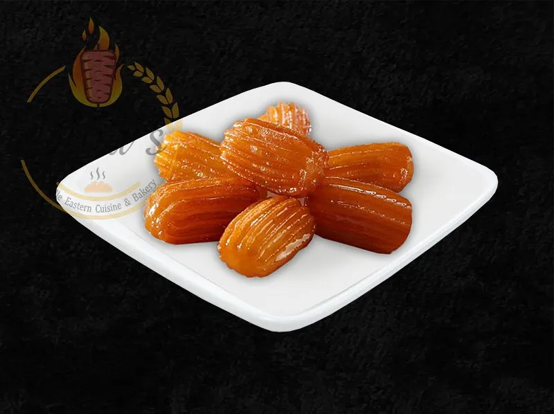 Sweet Datli dessert, a syrup-soaked pastry from the dina's restaurant menu