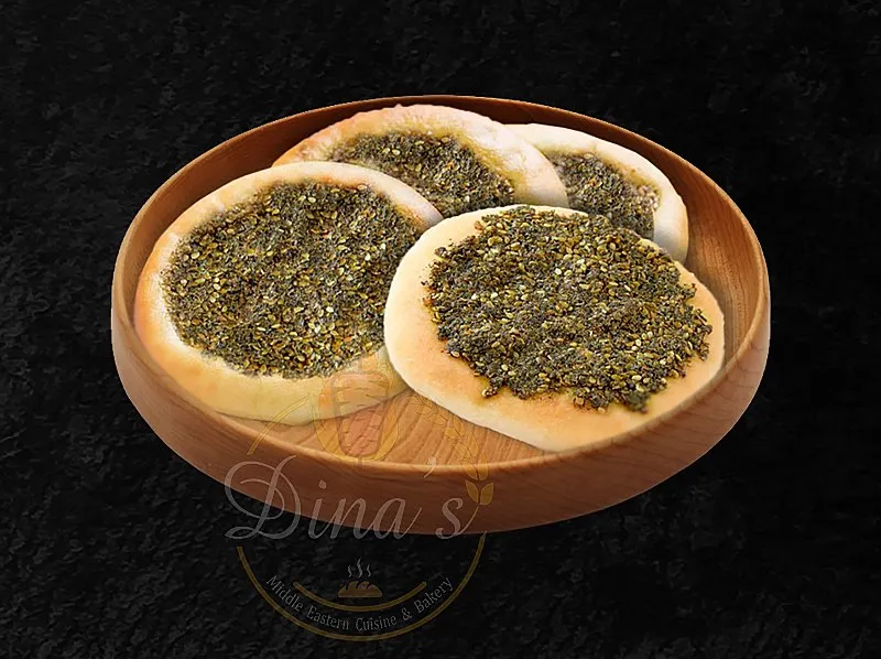 Fragrant Zaatar Bread, a traditional Lebanese hand pie from the dina's restaurant menu