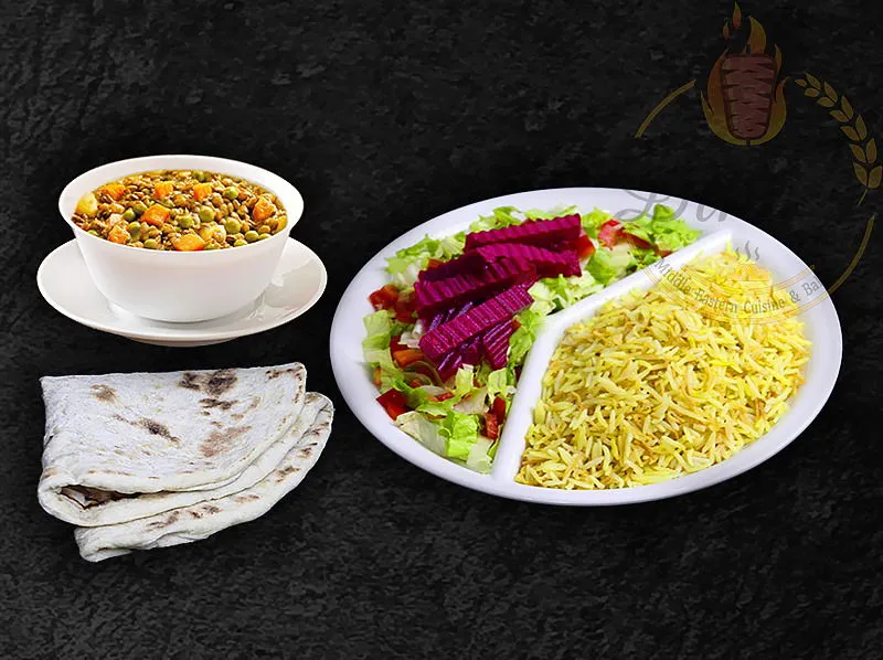 Vibrant Veggie Curry, a delightful vegetarian stew on the dina's restaurant menu