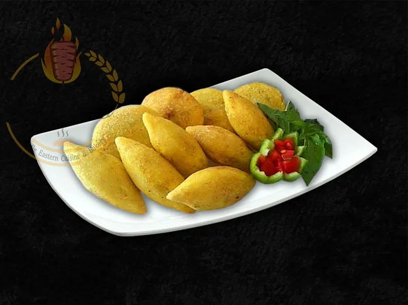 Savory Kebbeh, a traditional Middle Eastern side from the dina's restaurant menu