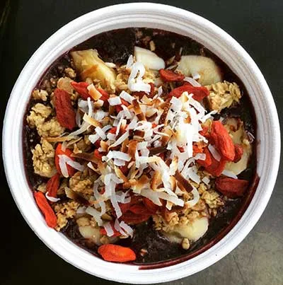 Goji Berries with coconut tops our Sunrise Goji Acai Bowl.