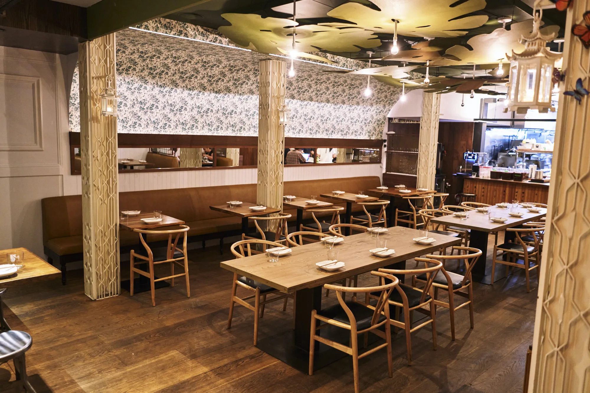 The inviting interior of a unique Chinese restaurant, designed to complement an exceptional dining experience with a modern Asian-inspired aesthetic.
