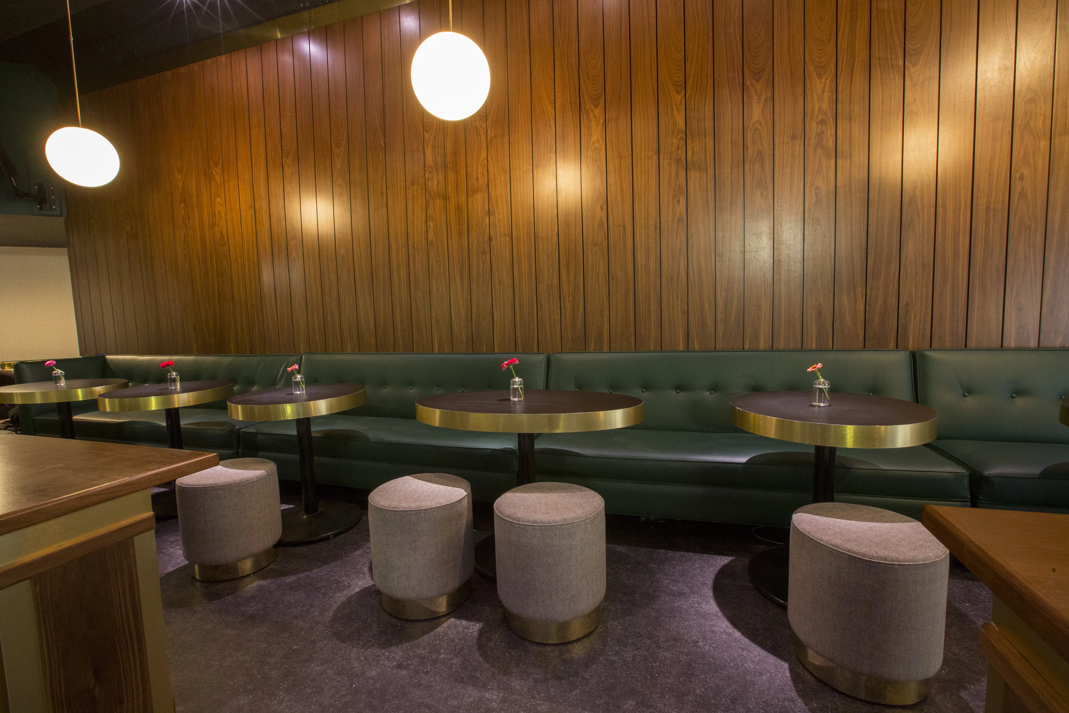 Interior of Dorian’s, inspired by ‘60s jazz clubs, showing the moody lighting and intimate setting