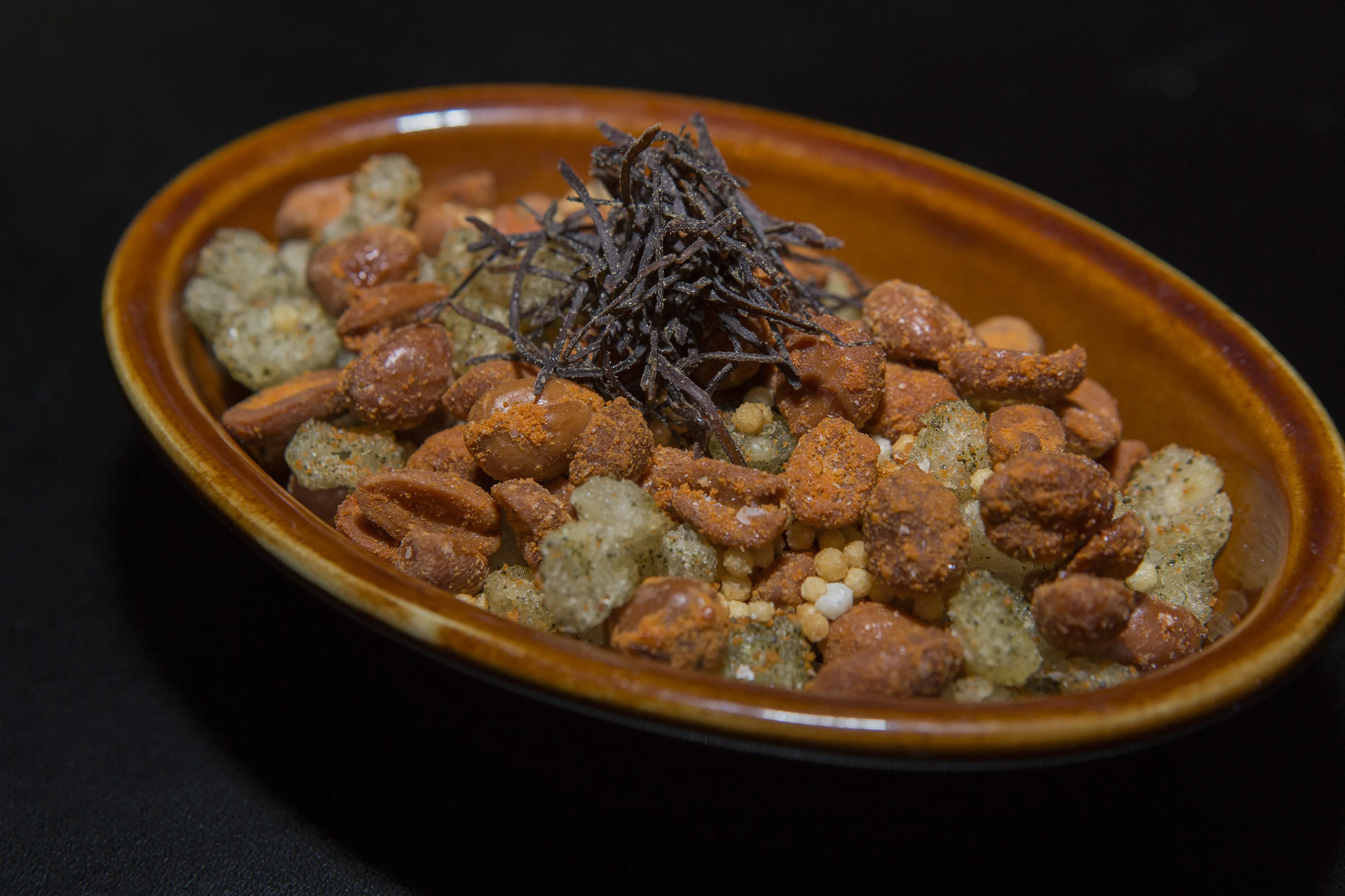 Sriracha fried peanuts, one of the inventive small plates on the menu that demonstrates Chef Fisher's Asian-inspired culinary range