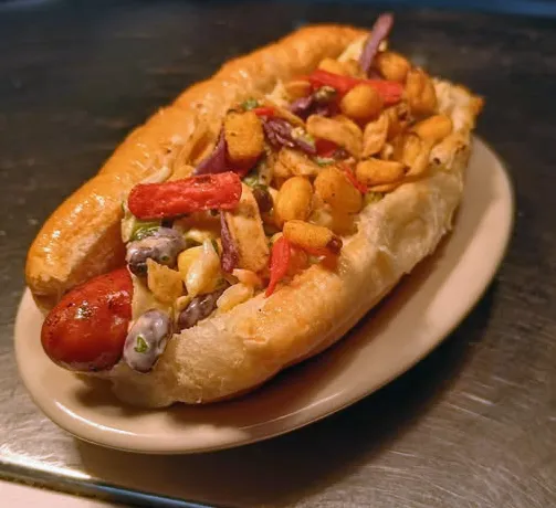 Spicy Slaw Dog, a creative hot dog variation on the 810 Munchies restaurant menu