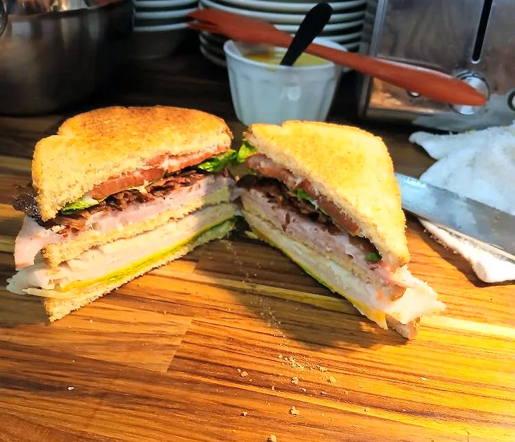 Club Sandwich, a multi-layered sandwich option from the 810 Munchies restaurant menu