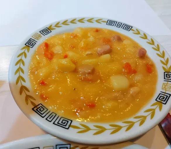 Potato and Ham Soup, a hearty comfort food item from the 810 Munchies restaurant menu