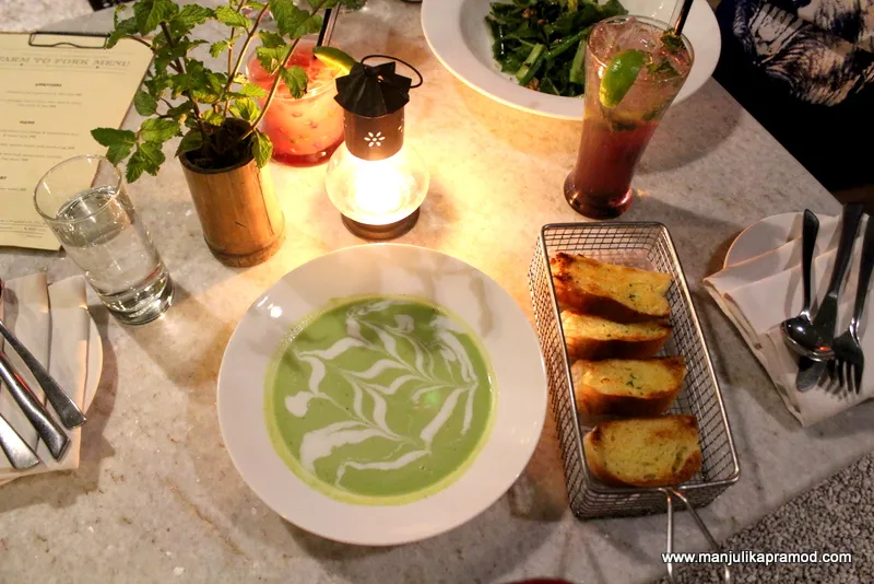 Chilled farm fresh green peas and mint soup, a starter on a farm to fork restaurant menu