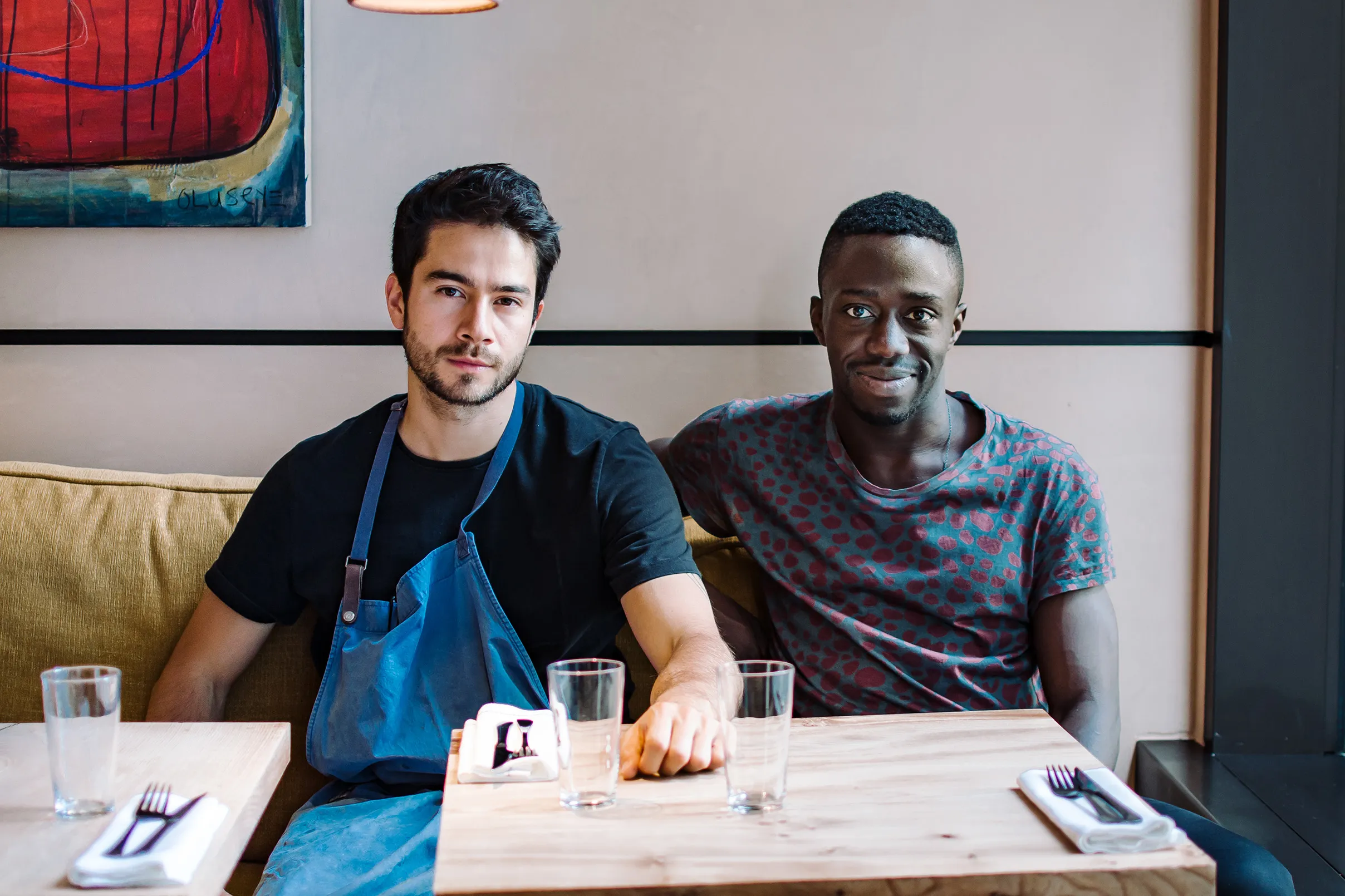 Chef Jeremy Chan and owner Iré Hassan-Odukale discussing the restaurant's menu changes and strategies inside their Michelin-starred London establishment.