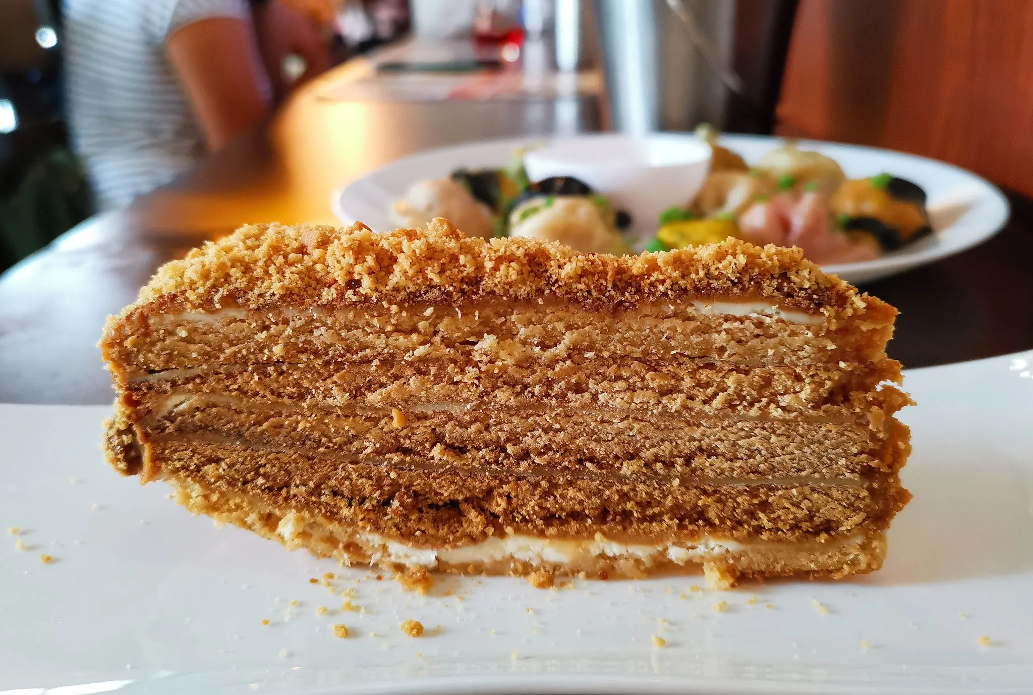 Soft, pillowy Dulce De Leche Crepes, a sweet and comforting dessert from a Russian menu restaurant