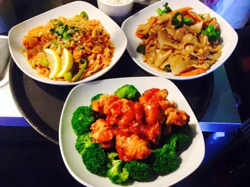 Colorful Entrees with Fresh Garlic and Thai Basil sauces on the restaurant menu