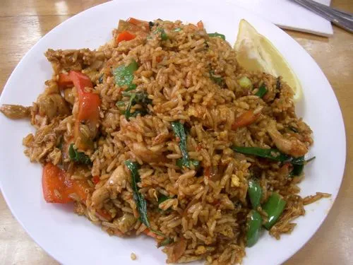 Piles of aromatic Thai Fried Rice and Pineapple Fried Rice dishes