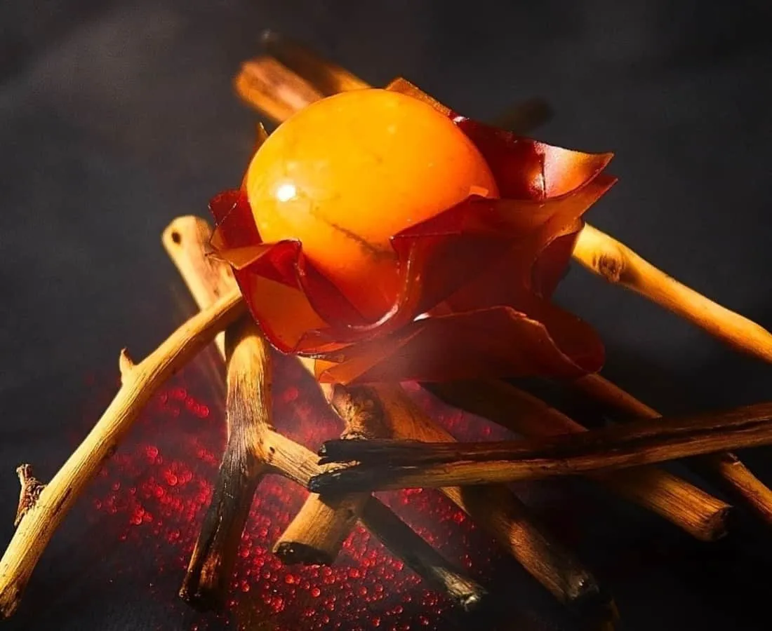 Chef Gaggan Anand presents a vibrant, multi-colored dish