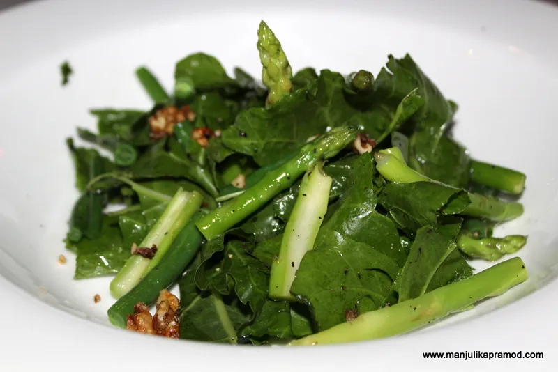 Green asparagus, runner beans, swiss chard and walnut salad from a farm to fork menu