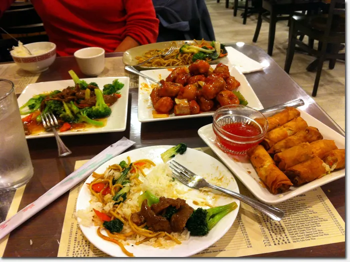 A flavorful plate of vegetable chow mein from the green island chinese restaurant menu, featuring thin noodles and fresh vegetables, exemplifying the restaurant's commitment to light and authentic Chinese dishes.