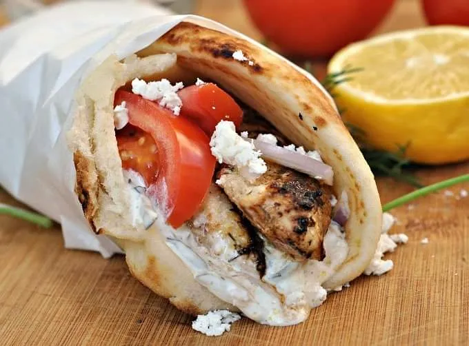 Hand cut beef and lamb gyros served in a pita wrap with fresh vegetables and tzatziki