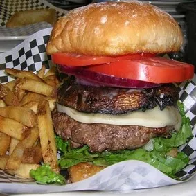 A flavorful Portabello mushroom steakburger, a vegetarian option available on the Marion restaurant menu.
