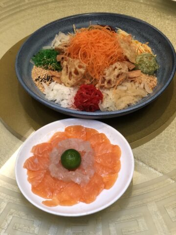 Vibrant Lobster and Salmon Yu Sheng, a highlight of the Asia Garden Chinese Restaurant Menu during festive seasons