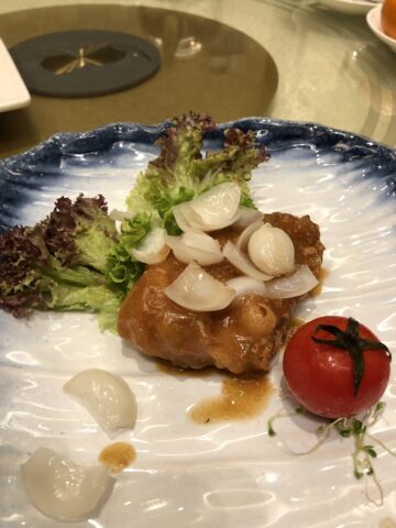 Delicately pan-fried sea perch fillet with lily bulb and foie gras sauce from the Asia Garden Chinese Restaurant Menu