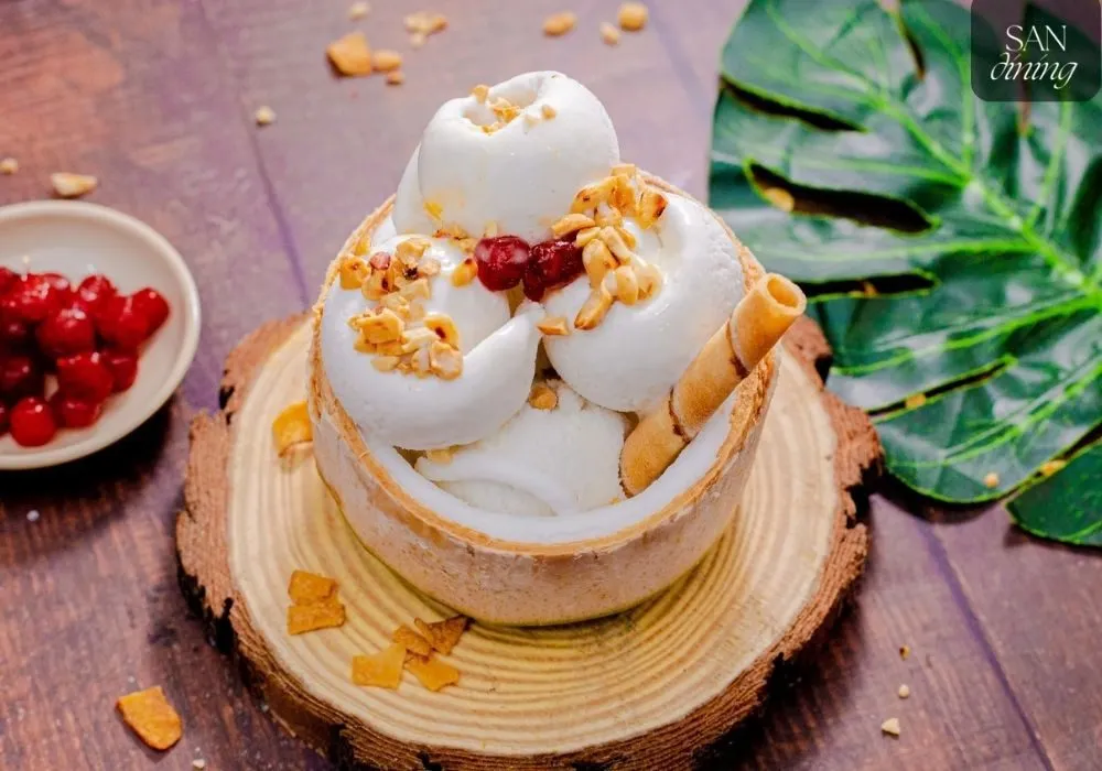 Kem Dua, creamy Vietnamese coconut ice cream in a half coconut shell