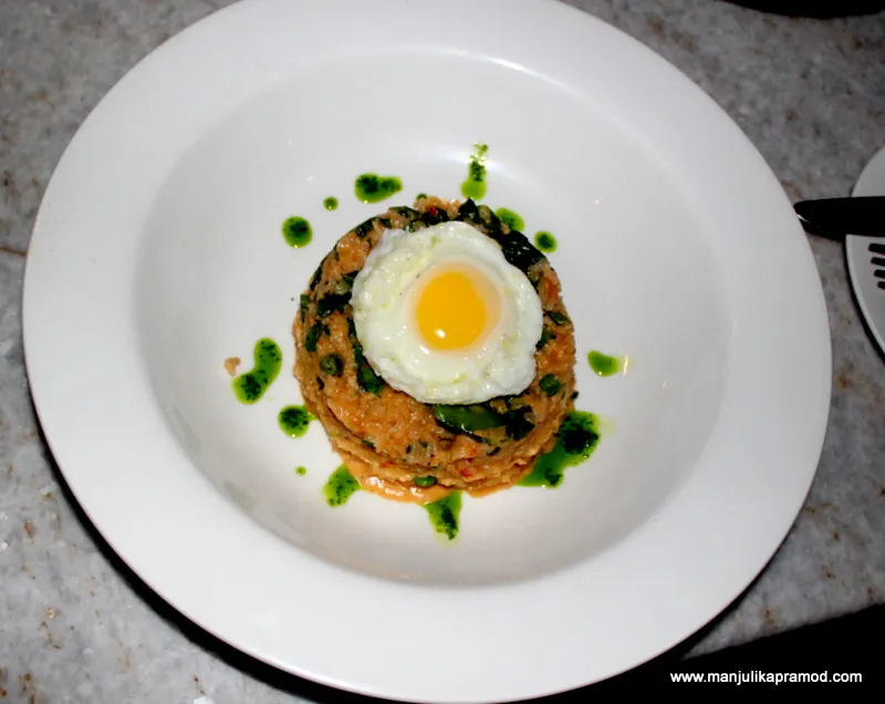 Risotto with shallots, sugar snap peas, and baby spinach, embodying farm to fork sustainability