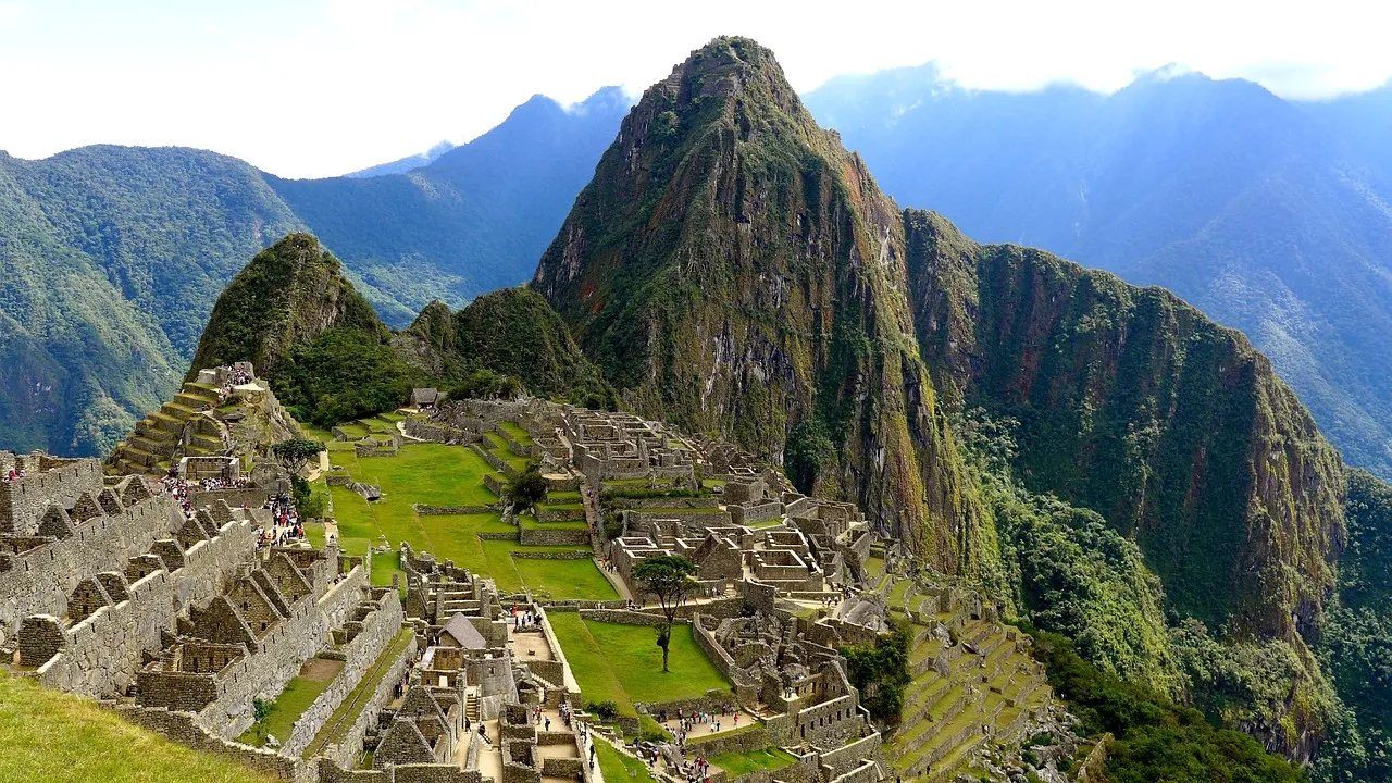 A striking panorama of the iconic Machu Picchu at sunrise, a world wonder and the ultimate destination of the trek