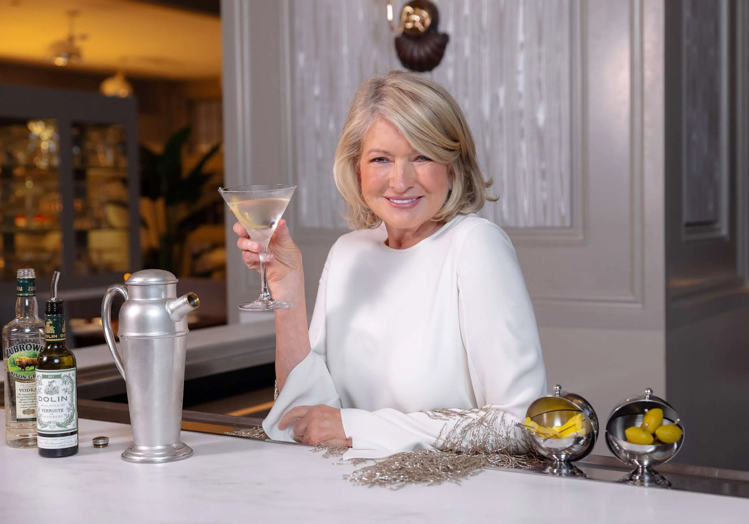 Martha Stewart in the sophisticated setting of The Bedford, presenting the refined Stewart's restaurant menu in Las Vegas.