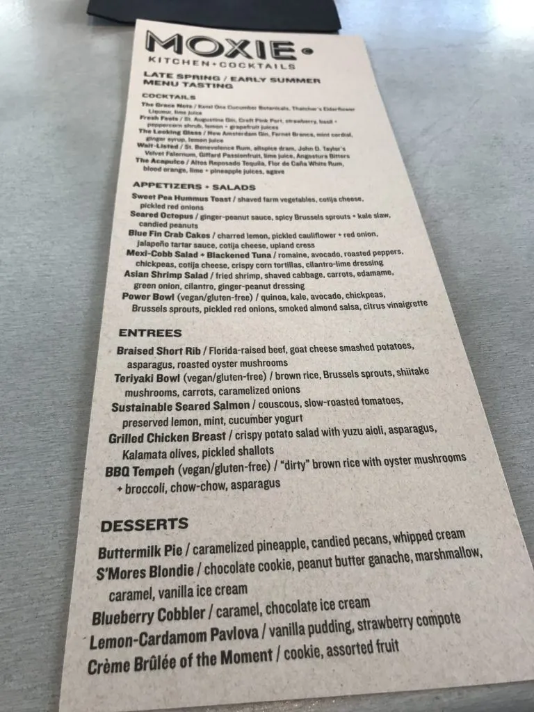 An appealing display of Moxie's summer menu, highlighting diverse culinary offerings and the restaurant's commitment to seasonal dining experiences