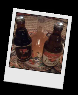 A variety of bottled and draft beers listed on the Asmara Restaurant menu, suitable for pairing with spicy food