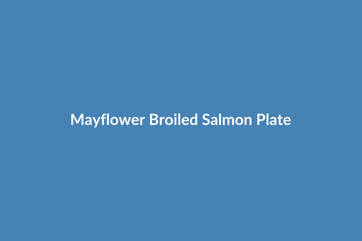 A plate of beautifully broiled salmon with a side of baked potato and mixed vegetables