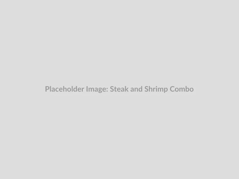 A detailed close-up of a perfectly cooked steak and shrimp combo dinner plate