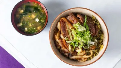 Pork Belly Donburi, a rich and savory rice bowl from the shiki japanese restaurant menu