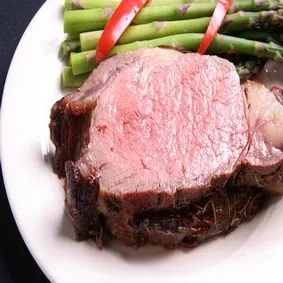 A perfectly cooked 16-oz. Park Avenue Cut of prime rib, a classic from the Marion restaurant menu.