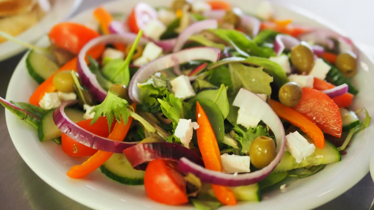 Interurban Restaurant's fresh salads menu with diverse options and pricing