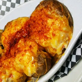 Decadent Crabmeat Stuffed Extra Large Mushrooms, a rich appetizer option from the Marion restaurant menu.