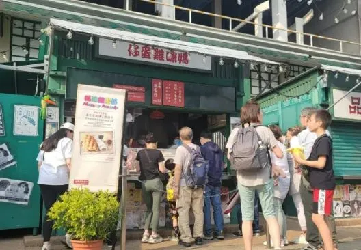 Customers lining up outside the popular Hong Kong restaurant Mammy Pancake location