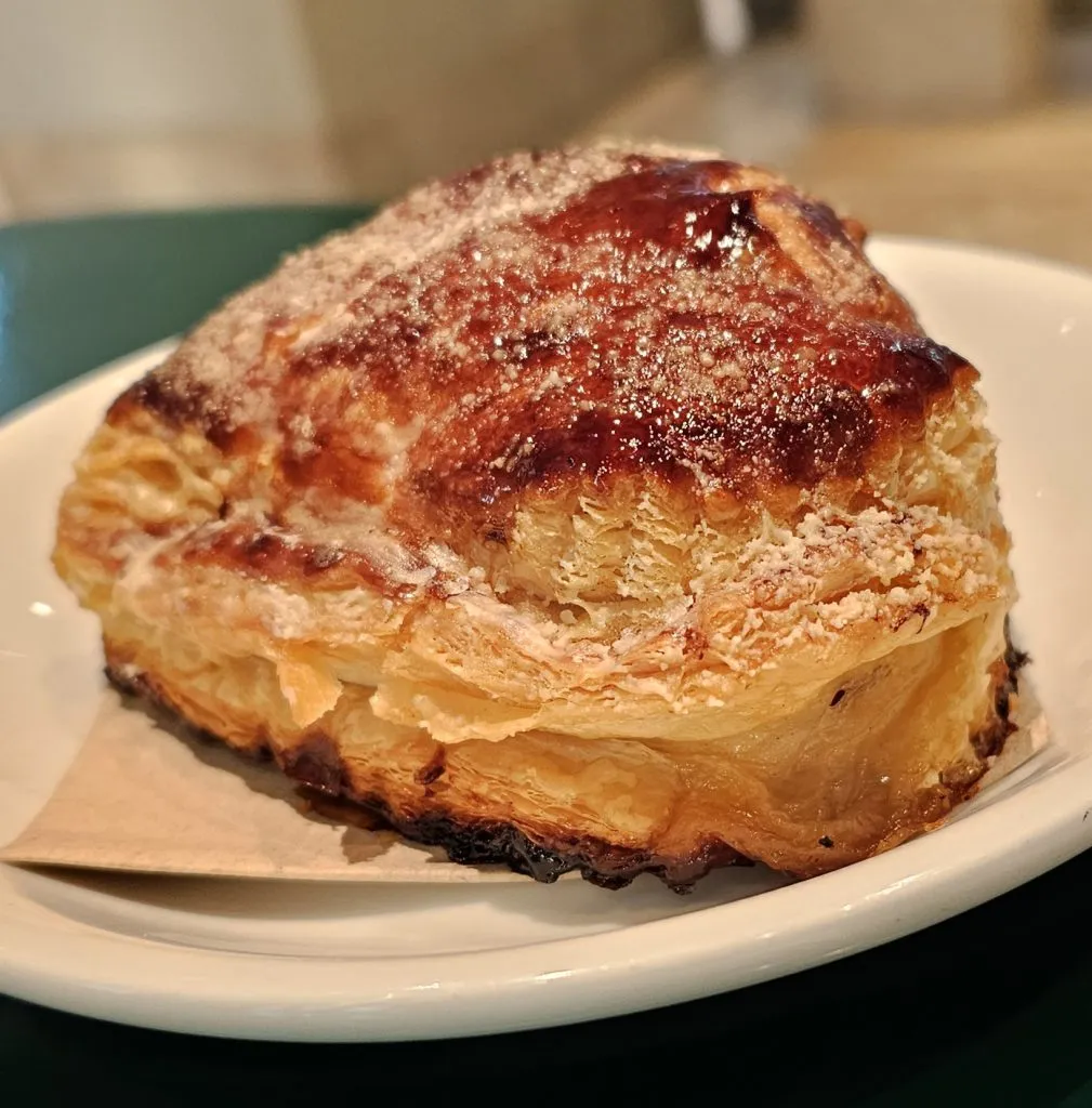 A close-up of a pastry at Bonanza Coffee Roasters, showcasing the start of a great food day